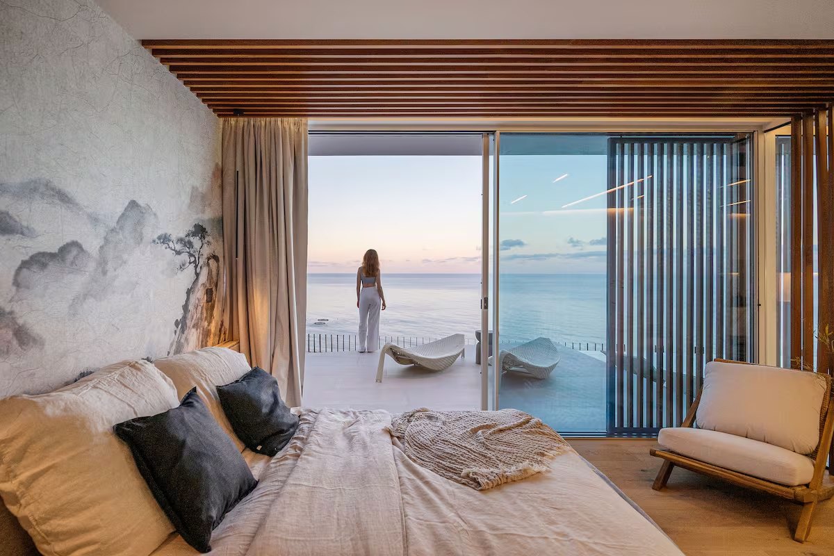 Aurora bedroom opening onto a wide Atlantic view